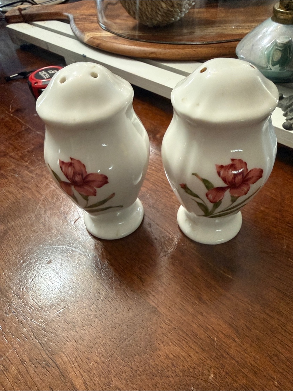 Noritake White Ceramic Salt and Pepper Shakers with Red Floral Motif blue on oth